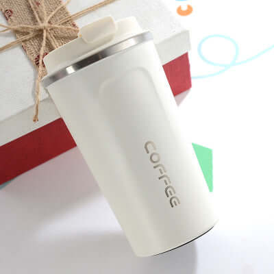 304 stainless steel travel mug with lid, stylish white insulated coffee cup for hot beverages.