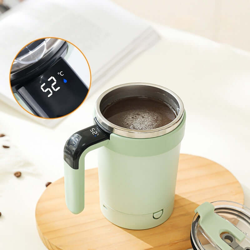 Self-stirring stainless steel travel mug with temperature display, perfect for coffee on the go.