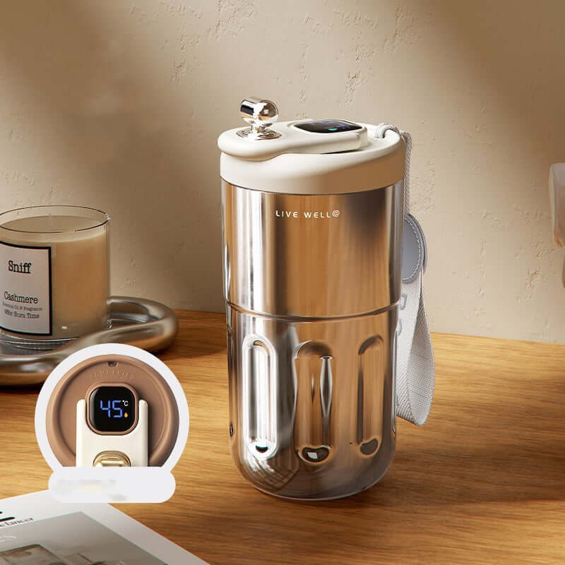Smart stainless steel travel mug with temperature control, sleek design, perfect for coffee and tea on the go.