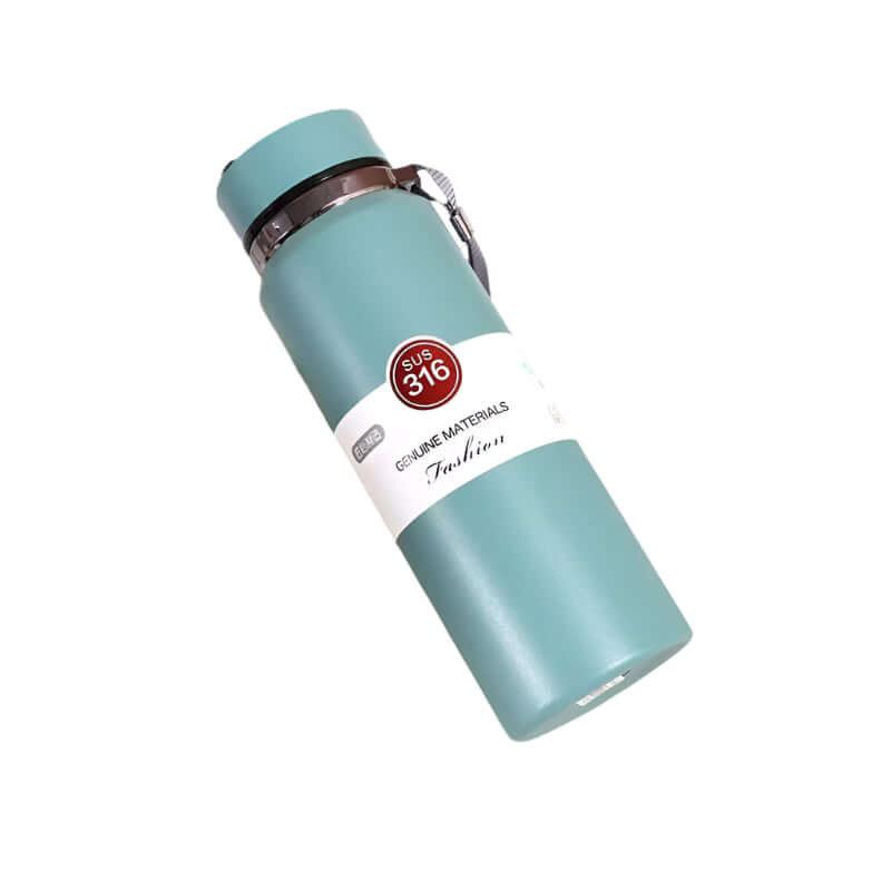 Stylish turquoise stainless steel vacuum insulation cup with lid, perfect for keeping beverages hot or cold.